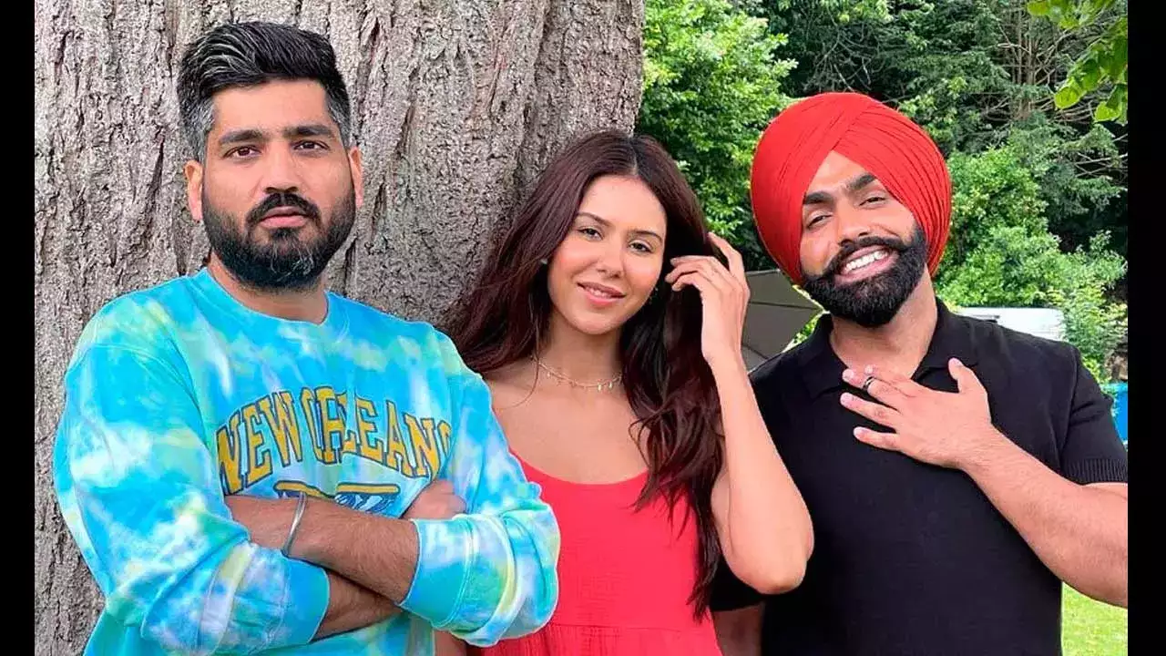 Sher Bagga director Jagdeep Sidhu with the film’s stars Ammy Virk and Sonam Bajwa.