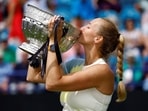 Czech Republic's Petra Kvitova celebrates with the trophy after winning the Eastbourne International women's final match.