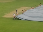 Prithvi Shaw pulling covers with groundsmen Prithvi Shaw pulling covers with groundsmen