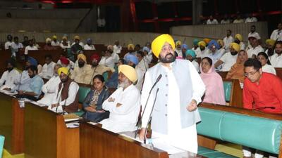 Chief minister Bhagwant Mann addressing the Punjab assembly on the second day of the budget session on Saturday. State finance minister Harpal Singh Cheema is seen seated beside him. (Ravi Kumar/HT) Chief minister Bhagwant Mann addressing the Punjab assembly on the second day of the budget session on Saturday. State finance minister Harpal Singh Cheema is seen seated beside him. (Ravi Kumar/HT)
