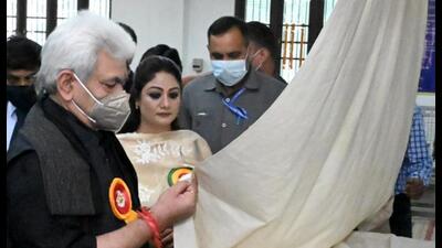 Lieutenant Governor Manoj Sinha during the inauguration of the Sukhnag Sozni Embroidery SFURTI Heritage Cluster of J&K Khadi and Village Industries Board, at Magam, in Budgam. (PTI)