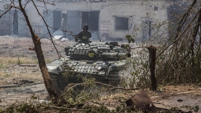 A Ukrainian tank is in position during heavy fighting on the front line in Severodonetsk, the Luhansk region, Ukraine. (AP) A Ukrainian tank is in position during heavy fighting on the front line in Severodonetsk, the Luhansk region, Ukraine. (AP)