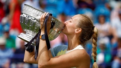 Czech Republic's Petra Kvitova celebrates with the trophy after winning the Eastbourne International women's final match. (Action Images via Reuters)