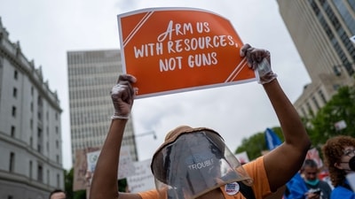 People march across the Brooklyn Bridge to protest against gun violence. (File image) (AFP)