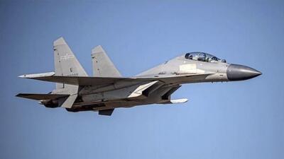 A Chinese PLA J-16 fighter jet flies in an undisclosed location. (AP/FILE)