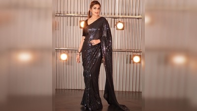 Sonali Bendre gave fans a full view of her black saree by striking different poses for the camera. (Instagram/@iamsonalibendre)