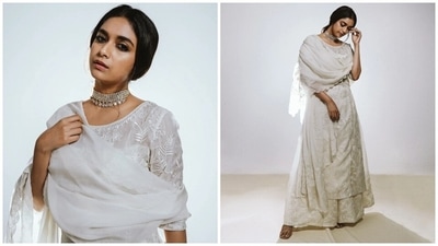 On Friday, Keerthy dropped several pictures of herself dressed in the ivory suit set on Instagram with the caption, "Reigning my love for [white] #VaashiPromotions." Celebrity stylist Archa Mehta styled the actor for the occasion. (Instagram)