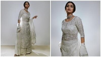Flared palazzo pants and dupatta with embroidered scalloped borders completed the outfit. Lastly, Keerthy styled the ensemble with strappy pumps, a gold Kundan adorned choker necklace, centre-parted loose ponytail, kohl-lined eyes, mascara on the lashes, glowing skin, and mauve lip shade. (Instagram) Flared palazzo pants and dupatta with embroidered scalloped borders completed the outfit. Lastly, Keerthy styled the ensemble with strappy pumps, a gold Kundan adorned choker necklace, centre-parted loose ponytail, kohl-lined eyes, mascara on the lashes, glowing skin, and mauve lip shade. (Instagram)