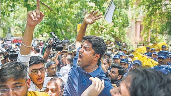 Youth Congress members protest outside the CPI(M) headquarters in New Delhi on Saturday over vandalisation of Rahul Gandhi’s office in Wayanad. (PTI)