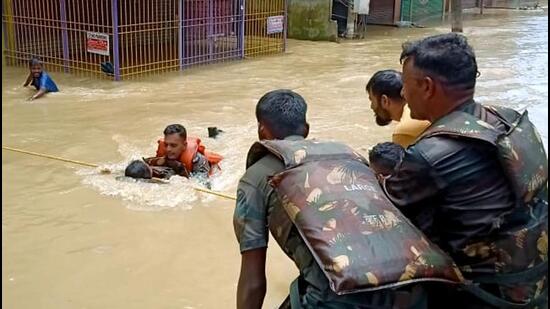 Indian Army personnel conduct a rescue operation in flood-affected areas of Silchar, in Cachar district of Assam on Saturday. (ANI PHOTO.)