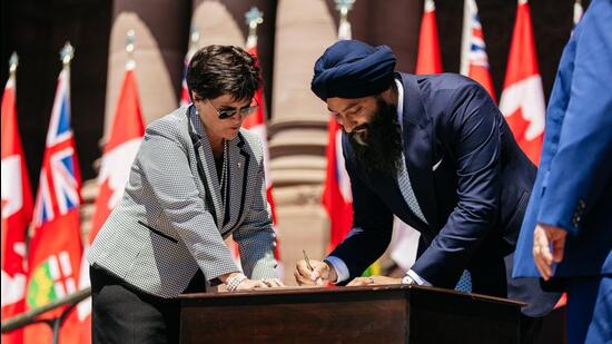 Prabhmeet Sarkaria (right) after being appointed to the Ontario Cabinet on Friday, but with an expanded mandate. (Prabhmeet Sarkaria/Twitter))