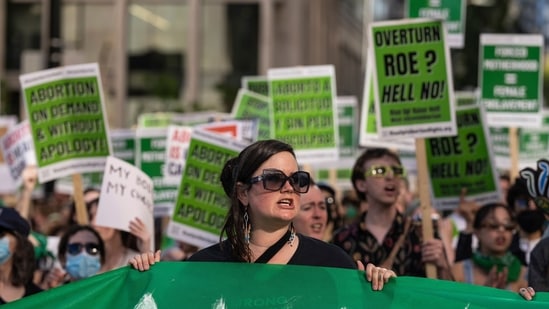 Protesters gather outside of the Jackson Federal Building in Seattle to support abortion rights.(AP) Protesters gather outside of the Jackson Federal Building in Seattle to support abortion rights.(AP)