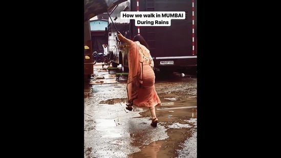 The image, taken from the viral Instagram video on Mumbai rains, shows Shraddha Arya.(Instagram/@sarya12)
