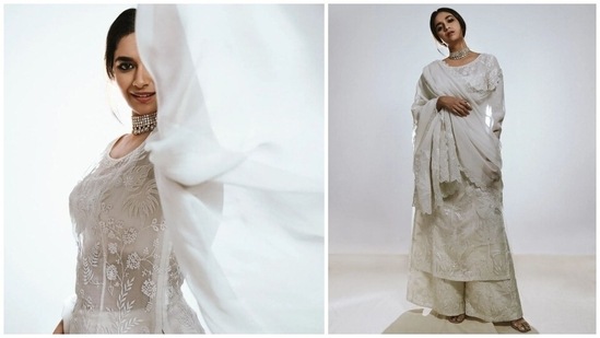 Keerthy's ensemble features a bateau neckline kurti with long sheer sleeves, scalloped cuffs, slits and pockets on the side, intricate thread embroidery, shimmering embellishments, and applique work.(Instagram)