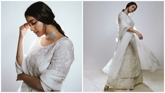 Meanwhile, the appliqué patchwork detailing on the suit set depicts swaying trees and flights of flamingos, making it a perfect pick for summers to beat the heat in style. You can take inspiration from Keerthy to upgrade your wardrobe with a similar ivory suit set and style it with maximalist accessories and makeup.(Instagram)