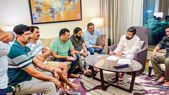 Rebel Shiv Sena leader Eknath Shinde with other MLAs during a meeting, in Guwahati on Wednesday, June 22, 2022. (PTI)