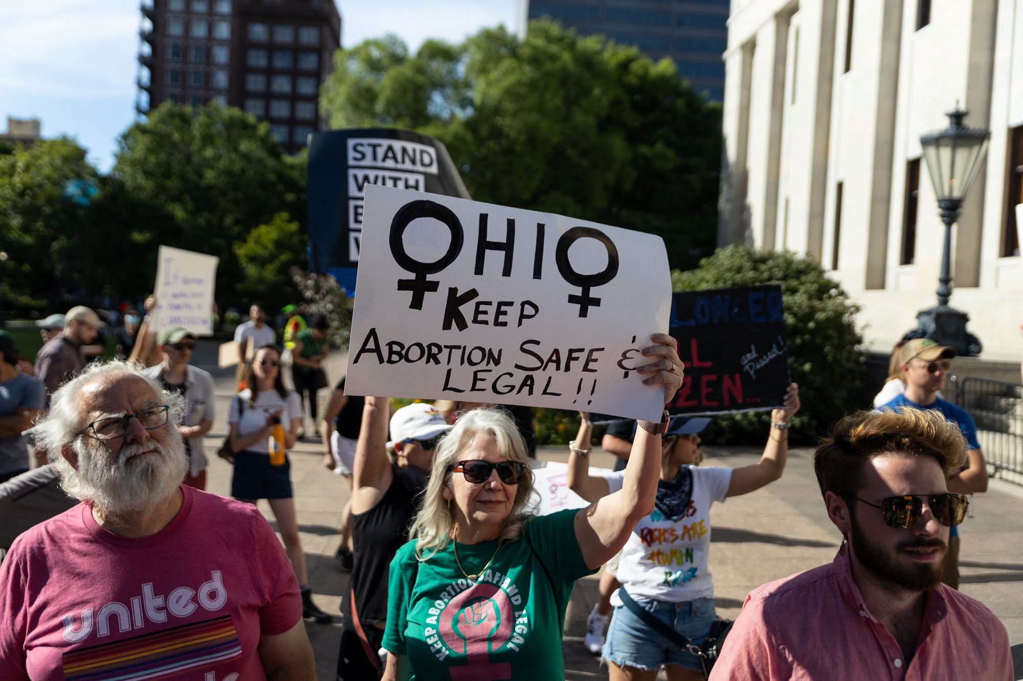 An abortion rights protester holds a sign to keep abortion safe in Ohio at a rally in Columbus, on June 24, 2022.&nbsp; (REUTERS)