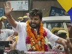 AAP candidate Durgesh Pathak waves at his supporters during celebrations after winning the Rajinder Nagar by-election in New Delhi.(PTI) AAP candidate Durgesh Pathak waves at his supporters during celebrations after winning the Rajinder Nagar by-election in New Delhi.(PTI)