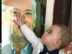 Karan Johar shared old pic of son Yash near Yash Johar's photo frame. Karan Johar shared old pic of son Yash near Yash Johar's photo frame.