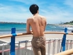 BTS' Jin debuts in a shirtless photo as he unveils his new tattoo. BTS' Jin debuts in a shirtless photo as he unveils his new tattoo.