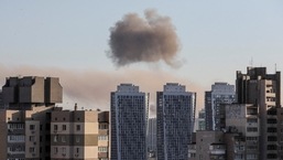 Smoke rises after a missile strike in Kyiv, Ukraine.