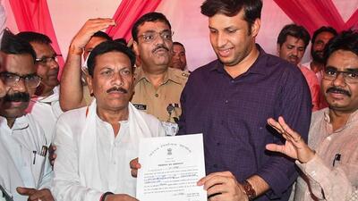 BJP candidate Ghanshyam Lodhi receives his election certificate after winning the Rampur Lok Sabha seat on Sunday. (PTI PHOTO) BJP candidate Ghanshyam Lodhi receives his election certificate after winning the Rampur Lok Sabha seat on Sunday. (PTI PHOTO)