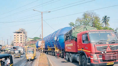 Kalyan, India - Nov. 25, 2020:Despite the prohibition of movement of heavy vehicles on the Govindwadi bypass road in Kalyan (West) activists claims that heavy vehicles still ply on that road. On Monday night a huge container rammed into the speed breaker followed by which the entire road was blocked for two days in Kalyan, India, on Wednesday, November 25, 2020. (Photo by Rishikesh Choudhary/ HT PHOTO) (HT PHOTO)