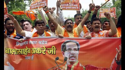 Shiv Sena supporters raise slogans holding placards as they stage a rally in support of the Maharashtra chief minister Uddhav Thackeray, New Delhi, August 26 (Amit Sharma)