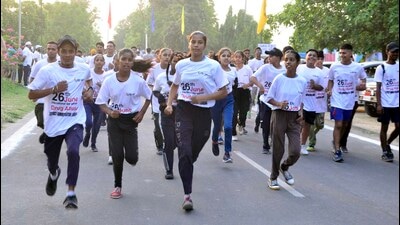 Residents participating in a marathon to mark International Day against Drug Abuse organised by the Ludhiana administration on Sunday. (Harvinder Singh/HT)