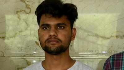 The suspect, 23-year-old Tanvir Hussain, in police custody on Sunday. (Sunil Ghosh/ HT) The suspect, 23-year-old Tanvir Hussain, in police custody on Sunday. (Sunil Ghosh/ HT)