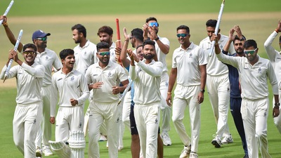 Madhya Pradesh's players celebrate their win after their team beat Mumbai by 6 wickets in the Ranji Trophy final cricket match. (PTI)