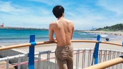 BTS' Jin debuts in a shirtless photo as he unveils his new tattoo. BTS' Jin debuts in a shirtless photo as he unveils his new tattoo.