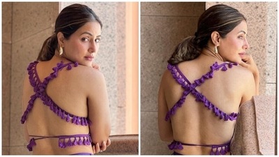 The highlight of Hina's cropped top is its back, and we are obsessed with it. It features long straps extending from the sleeves and forming a criss-cross section on the back, adorned with multiple tassels. (Instagram) The highlight of Hina's cropped top is its back, and we are obsessed with it. It features long straps extending from the sleeves and forming a criss-cross section on the back, adorned with multiple tassels. (Instagram)
