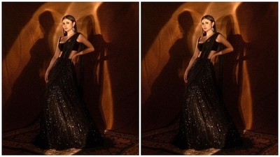 To accessorise the lehenga set, Mouni picked chic statement jewellery pieces. She opted for dangling earrings adorned with large ruby stones and embellished rings. Lastly, centre-parted open tresses rounded off her hairdo. (Instagram) To accessorise the lehenga set, Mouni picked chic statement jewellery pieces. She opted for dangling earrings adorned with large ruby stones and embellished rings. Lastly, centre-parted open tresses rounded off her hairdo. (Instagram)