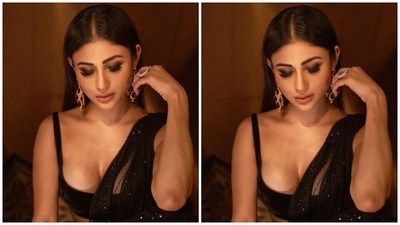 On Sunday, Mouni posted new pictures of herself from a photoshoot that showed her dressed in a black embellished lehenga set. The star captioned her post, "The soul should always stand ajar, ready to welcome the ecstatic experience." (Instagram) On Sunday, Mouni posted new pictures of herself from a photoshoot that showed her dressed in a black embellished lehenga set. The star captioned her post, "The soul should always stand ajar, ready to welcome the ecstatic experience." (Instagram)