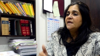 Crime branch officials produce social activist Teesta Setalvad at the Metropolitan Magistrate Court in Ahmedabad, Sunday. (AFP File Photo) Crime branch officials produce social activist Teesta Setalvad at the Metropolitan Magistrate Court in Ahmedabad, Sunday. (AFP File Photo)