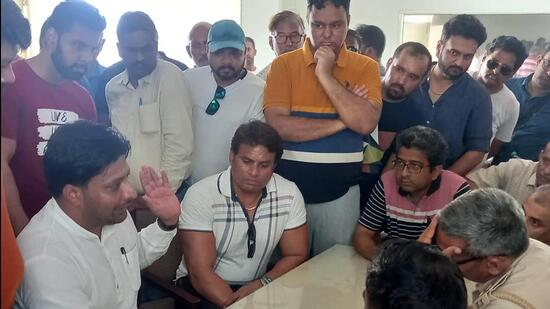 Gurugram, India - June 26: Residents of Ansal Esencia colony protest against the lack of electricity infrastructure and poor maintenance, at Sector-65 police station, in Gurugram, India, on Sunday, June 26, 2022. (Photo by Parveen Kumar/Hindustan Times) **To go with Abhishek Behl's story**