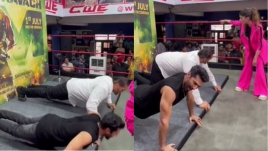 Aditya Roy Kapur doing pushups with The Great Khali. Aditya Roy Kapur doing pushups with The Great Khali.