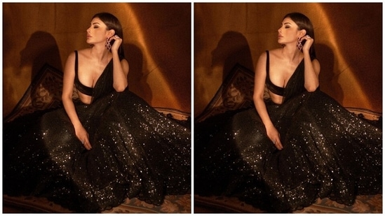 Mouni turned muse for Indian fashion designer Sawan Gandhi for the photoshoot. She picked a sequinned lehenga and short choli set with a net dupatta from his label and looked exquisite as always.(Instagram)