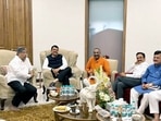 Leader of Opposition Devendra Fadnavis with BJP Maharashtra president Chandrakant Patil and party leaders during a meeting in Mumbai on Monday.(ANI)