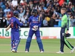 India's Dinesh Karthik and Deepak Hooda celebrate their win in the T20I cricket match vs Ireland.