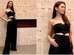 Rakul Preet's fashion game is always on point. From looking like a vision in chikankari kurtas to acing the glam red carpet look, the Runway 34 actor never misses an opportunity in impressing the fashion gods with her gorgeous fits. In her recent Instagram photos, Rakul can be seen rocking the casual look as she stepped out in a black co-ord set comprised of a bandeau top and long pants.(Instagram/@raulpreet)