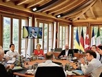 Ukraine’s President Volodymyr Zelensky (on screen) addresses G7 leaders and representatives of the European Union during their working session at Elmau Castle, Germany, on Monday. Ukraine’s President Volodymyr Zelensky (on screen) addresses G7 leaders and representatives of the European Union during their working session at Elmau Castle, Germany, on Monday.