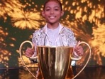 Nobojit Narzary poses with his winner's trophy on the Dance India Dance Lil Masters' stage.