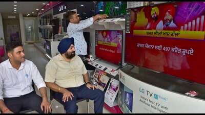 A shopkeeper watching the budget session in Ludhiana on Monday. (Gurpreet SIngh/HT) A shopkeeper watching the budget session in Ludhiana on Monday. (Gurpreet SIngh/HT)