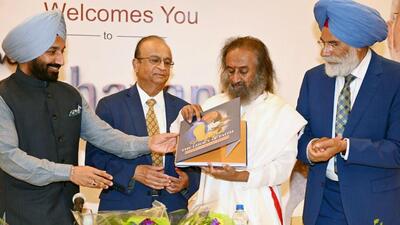 Spiritual leader and Art of Living Founder Sri Sri Ravi Shankar at the international launch of two books on Prime Minister Narendra Modi at the 'Vishwa Sadbhavana' event organised by the NID Foundation, in Chicago on Monday. (ANI)
