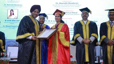 Ludhiana-based doctor Rajoo Singh Chhina being given the award of excellence by the Union ministry of health and family welfare. (HT Photo)