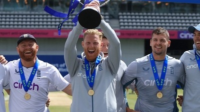 England's Ben Stokes celebrates with the trophy and teammates after winning the match and the series vs New Zealand. (Action Images via Reuters)