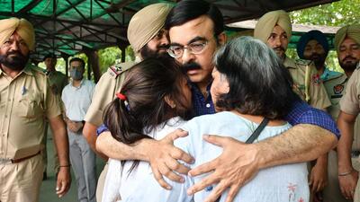 IAS officer Sanjay Popli consoling his wife and a relative at the cremation of his son, Kartik Popli, at the Cremation Ground in Sector 25, Chandigarh, on Monday. (Keshav Singh/HT) IAS officer Sanjay Popli consoling his wife and a relative at the cremation of his son, Kartik Popli, at the Cremation Ground in Sector 25, Chandigarh, on Monday. (Keshav Singh/HT)
