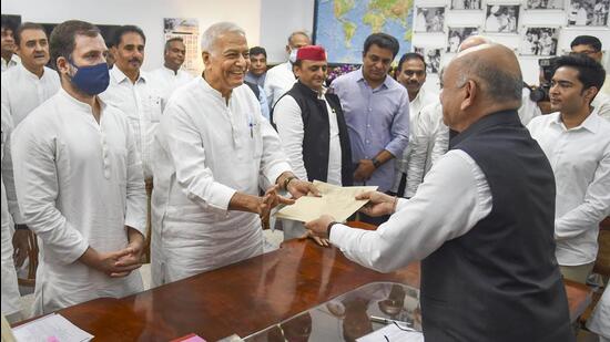 Opposition candidate Yashwant Sinha files his nomination papers for presidential elections at the Parliament House in New Delhi on Monday. (PTI Photo)